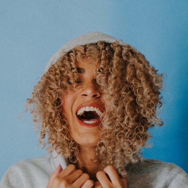 A guest laughing with excitement